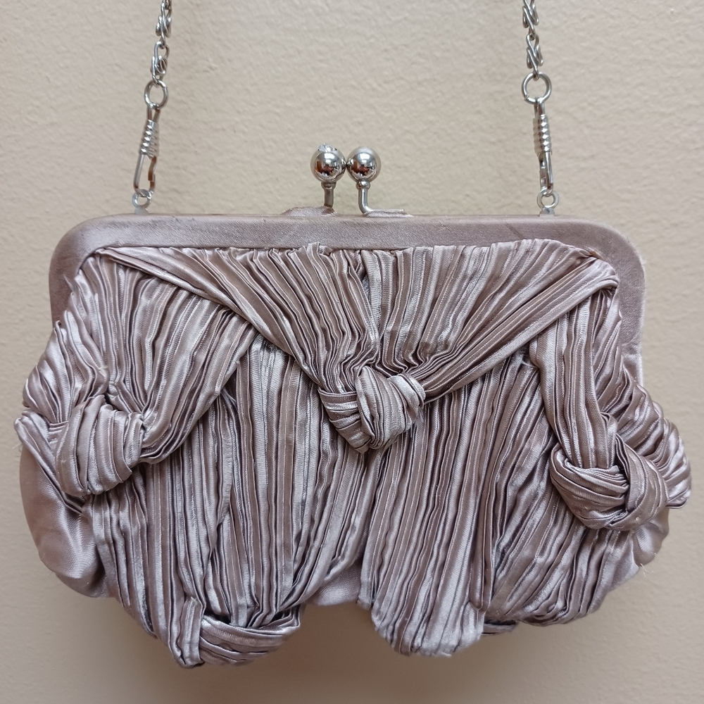 Gold knot dress purse with jewel closure